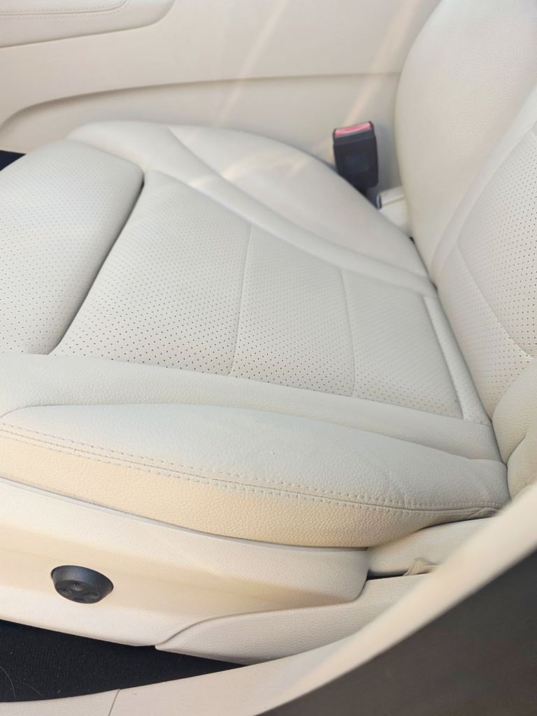 Completed automotive leather seat repair by AutoPro Interior